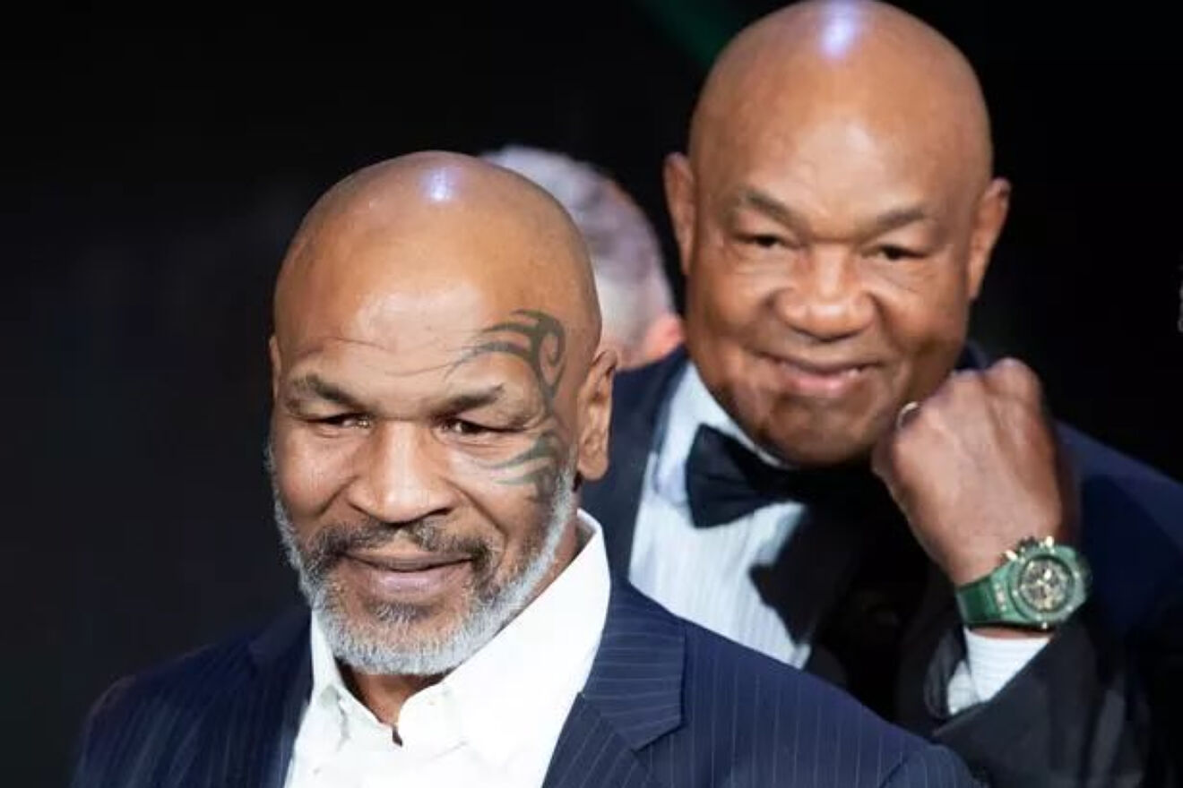 Mike Tyson (Izq.) junto a George Foreman (Der.)